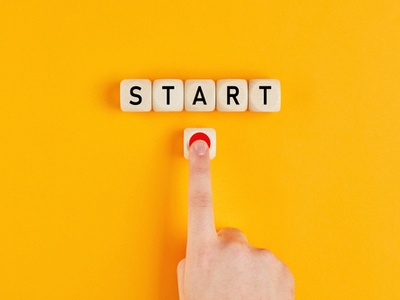 pushing a start button